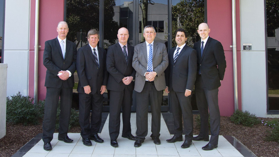 The LDB partners in front of the LDB building
